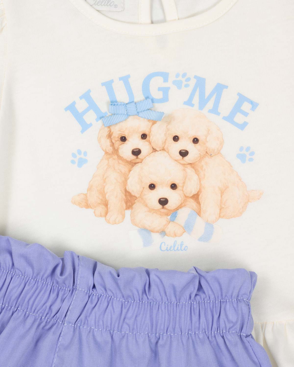 Conjunto  blusa blanca estampada y short lila para bebé niña