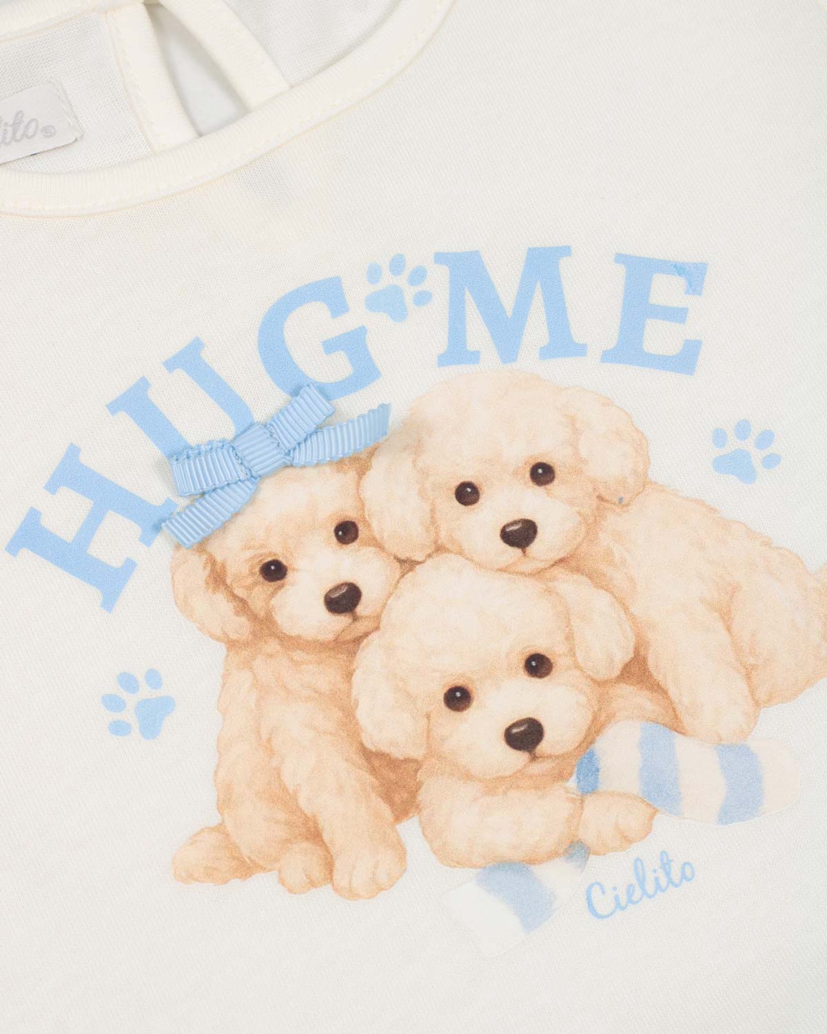 Conjunto  blusa blanca estampada y short lila para bebé niña