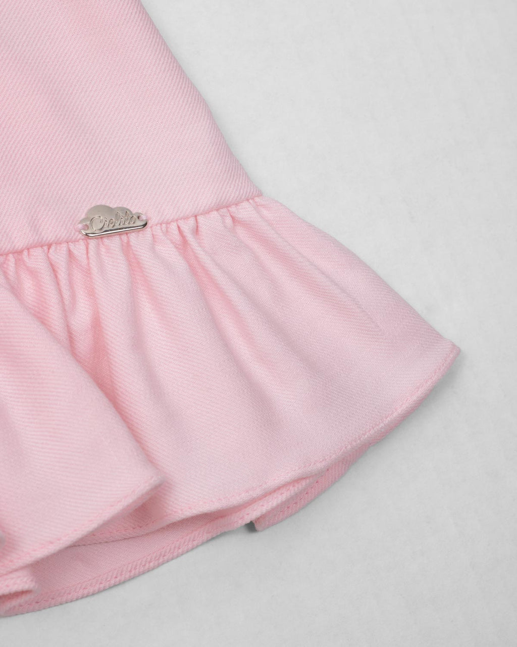 Vestido rosa de tiras con moñito para bebé niña