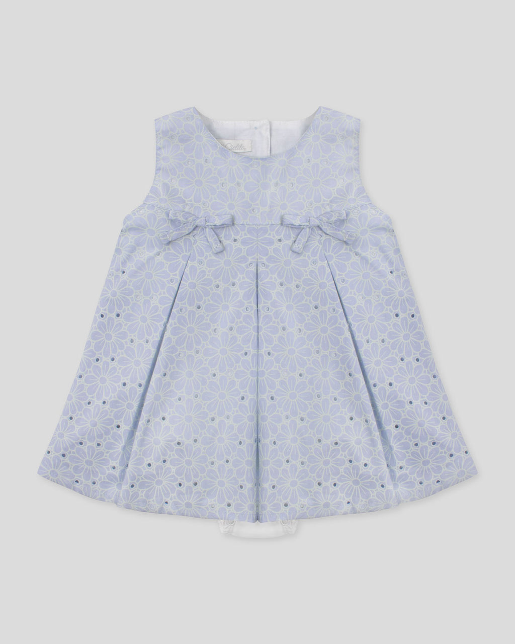 Vestido body en tela hoja rota azul con flores y moñitos para bebé niña