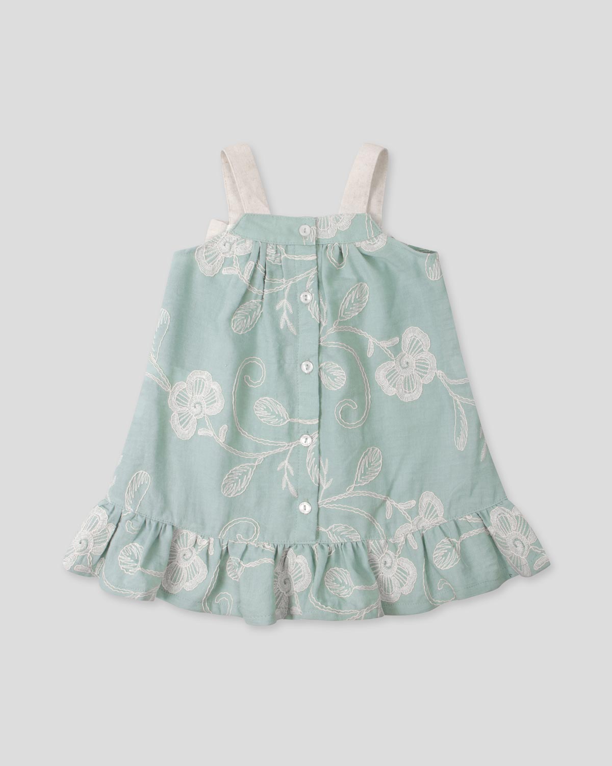 Vestido verde menta de tiras en tela bordada con moño para bebé niña