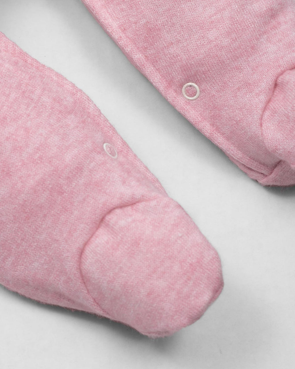 Pijama enteriza rosa con botones y boleros para recién nacida