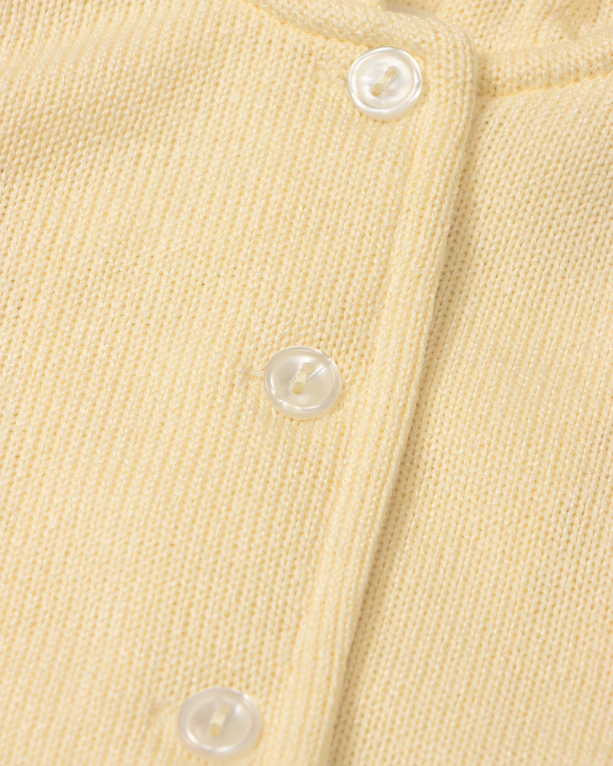 Pijama amarilla de dos piezas con gorrito para bebé