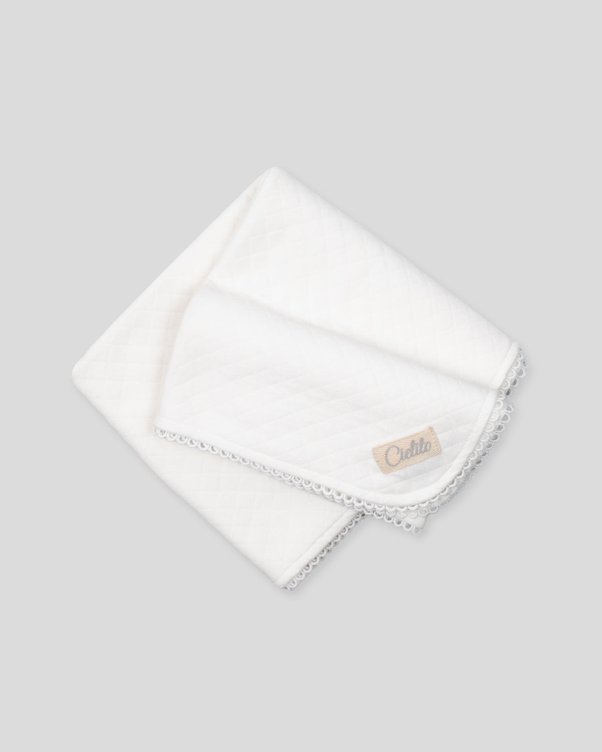 Cobija blanca para recién nacido