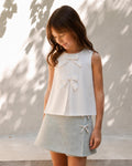 Conjunto blusa blanca con falda short verde para niña
