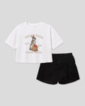 Conjunto blusa blanca con estampado de conejito y falda short negra con moño para niña