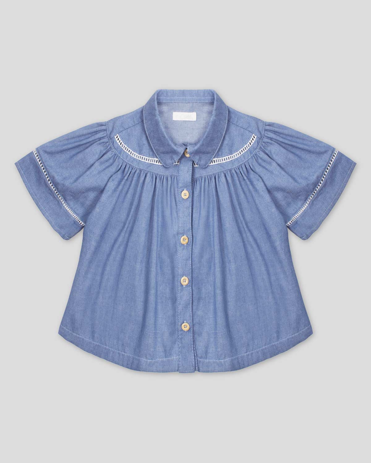 Blusa en chambray con botones para niña