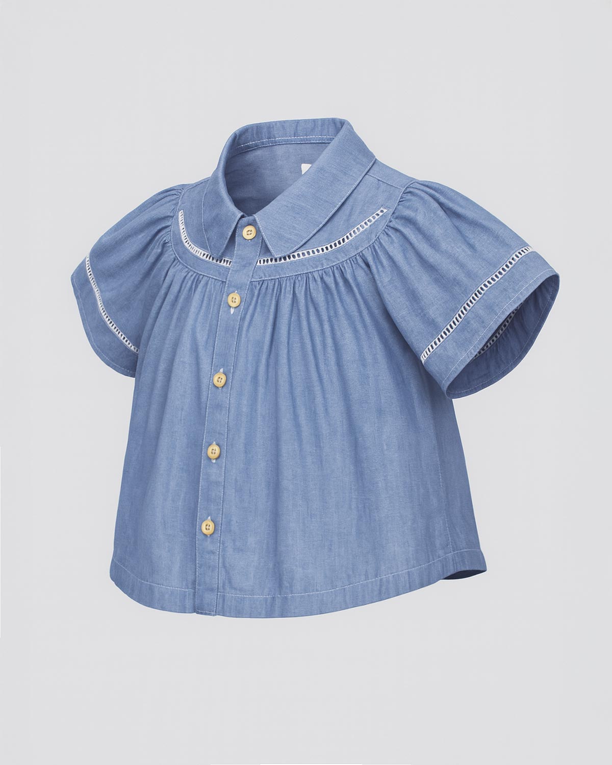 Blusa en chambray con botones para niña