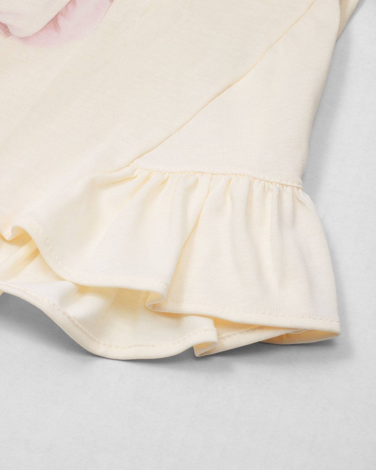 Blusa vainilla con estampado y boleros para niña