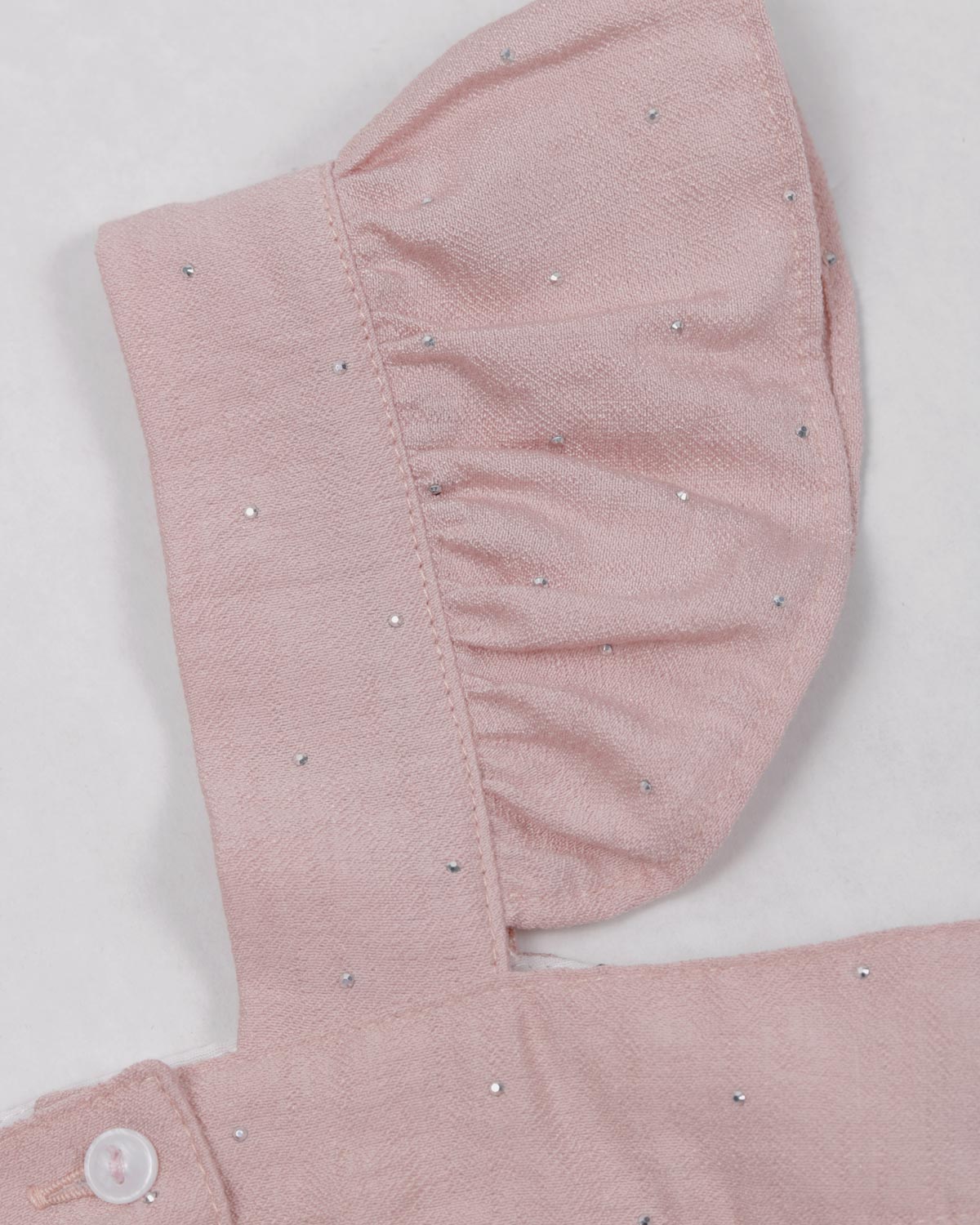 Blusa rosa con brillos y tiras con boleritos para niña