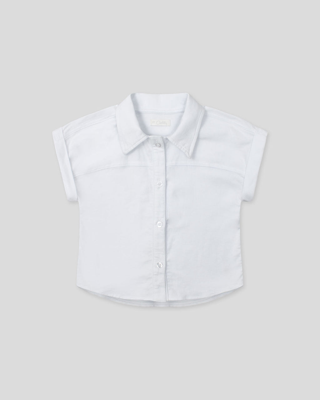 Camisa blanca de botones manga corta para niña