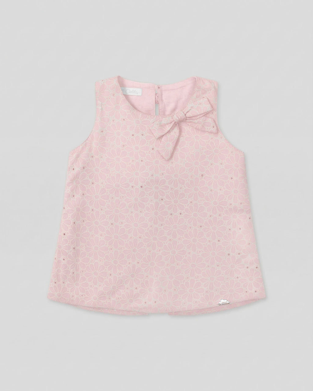 Blusa tela hoja rota rosa con moños para niña