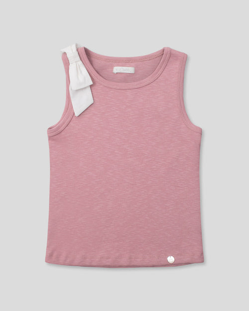Camiseta manga sisa rosada con moño blanco en hombro para niña