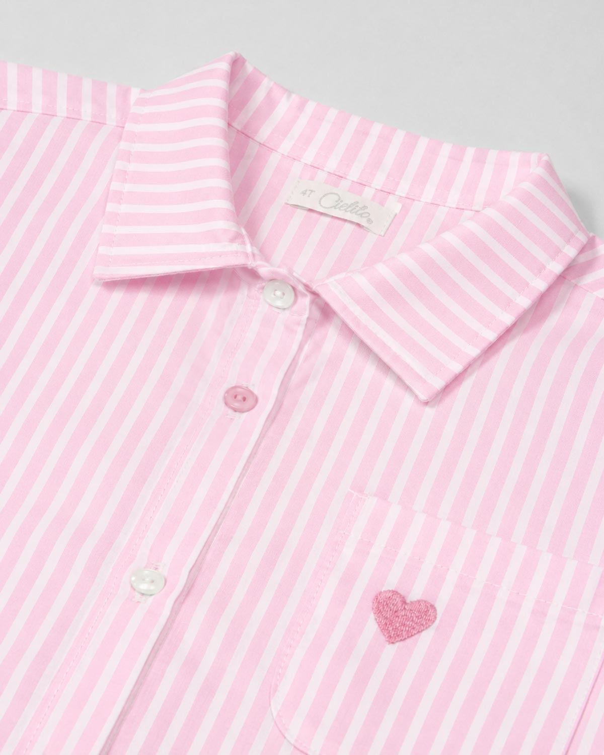 Camisa de rayas rosa con corazón bordado para niña