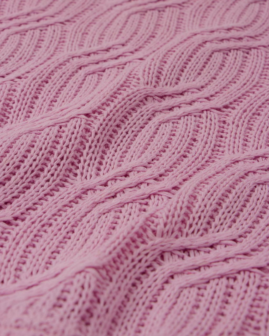 Saco en tejido trenzado rosa para niña