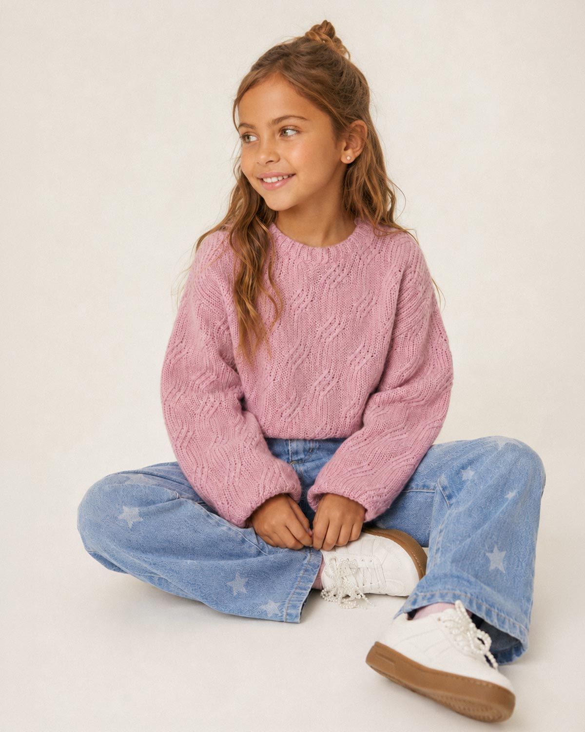 Saco en tejido trenzado rosa para niña