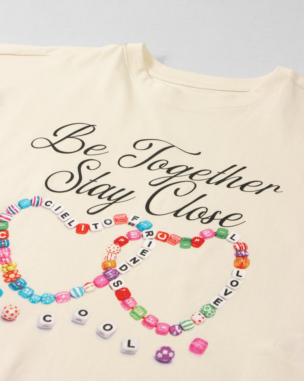 Camiseta cruda estampada para niña
