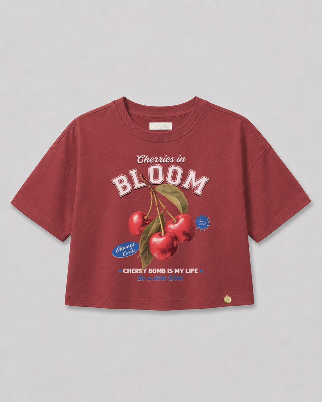 Camiseta roja con estampado de cerezas para niña