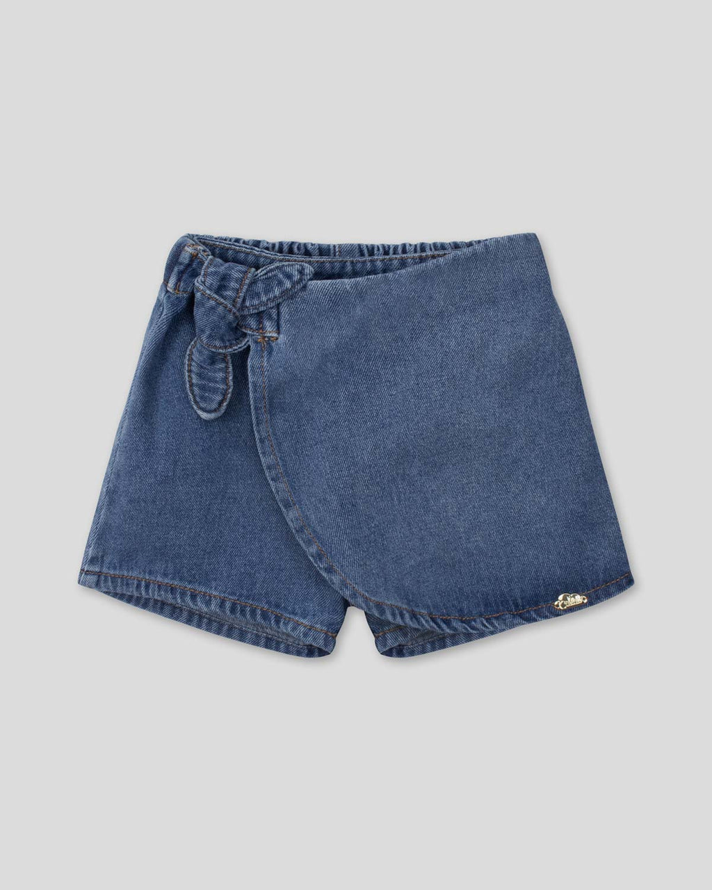 Falda short denim para niña