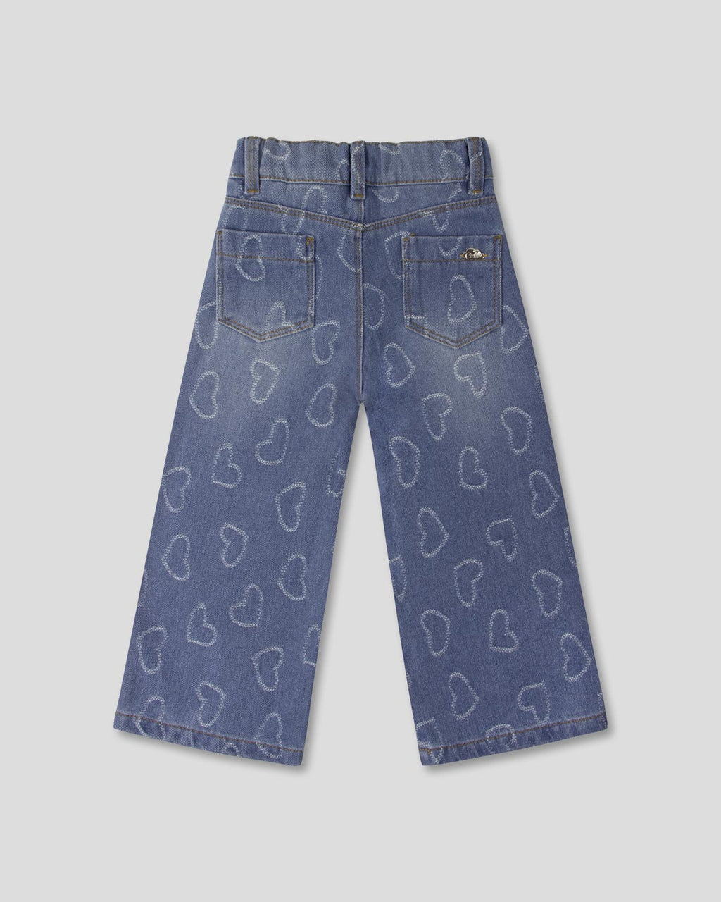 Jean denim con diseño de corazones para niña