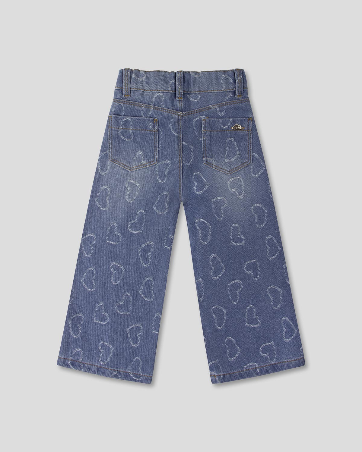Jean denim con diseño de corazones para niña