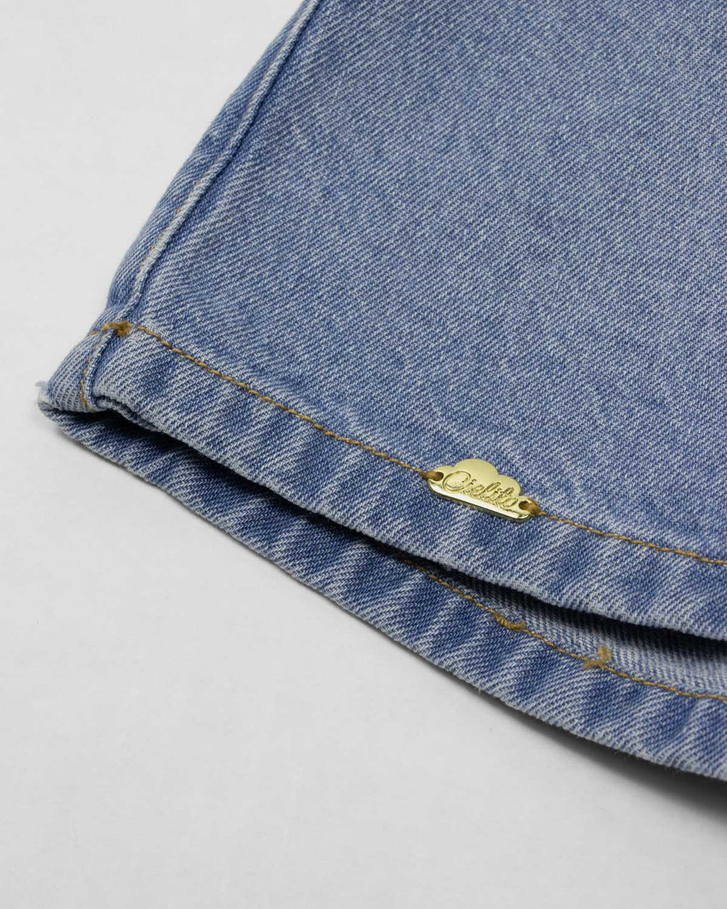Falda short denim con moño para niña