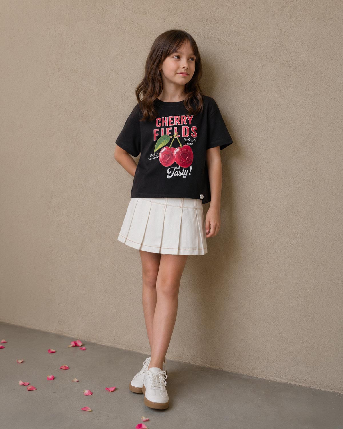 Falda short cruda con pliegues para niña