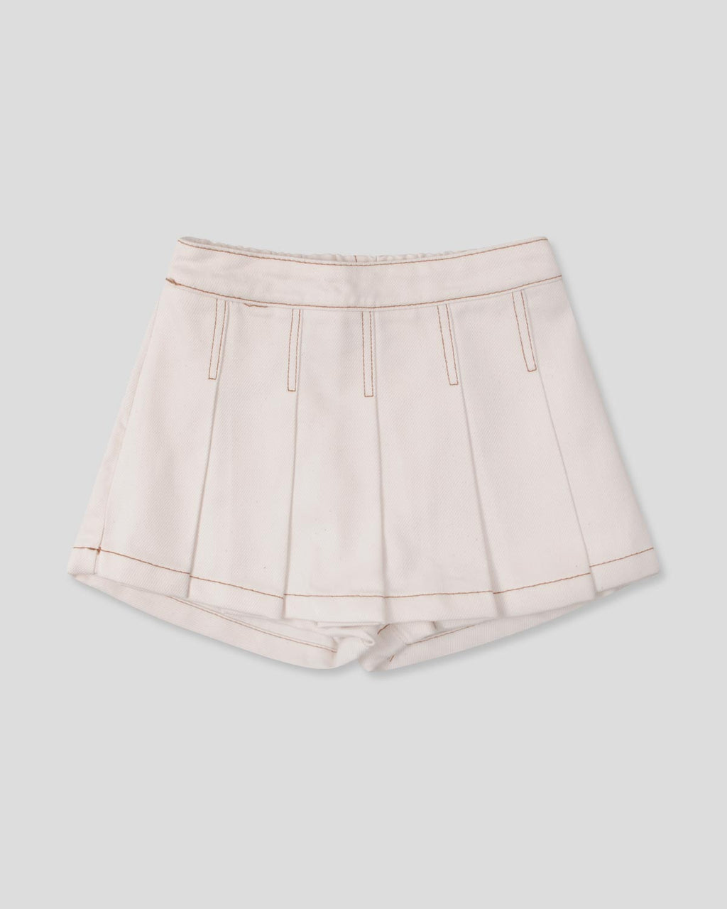 Falda short cruda con pliegues para niña