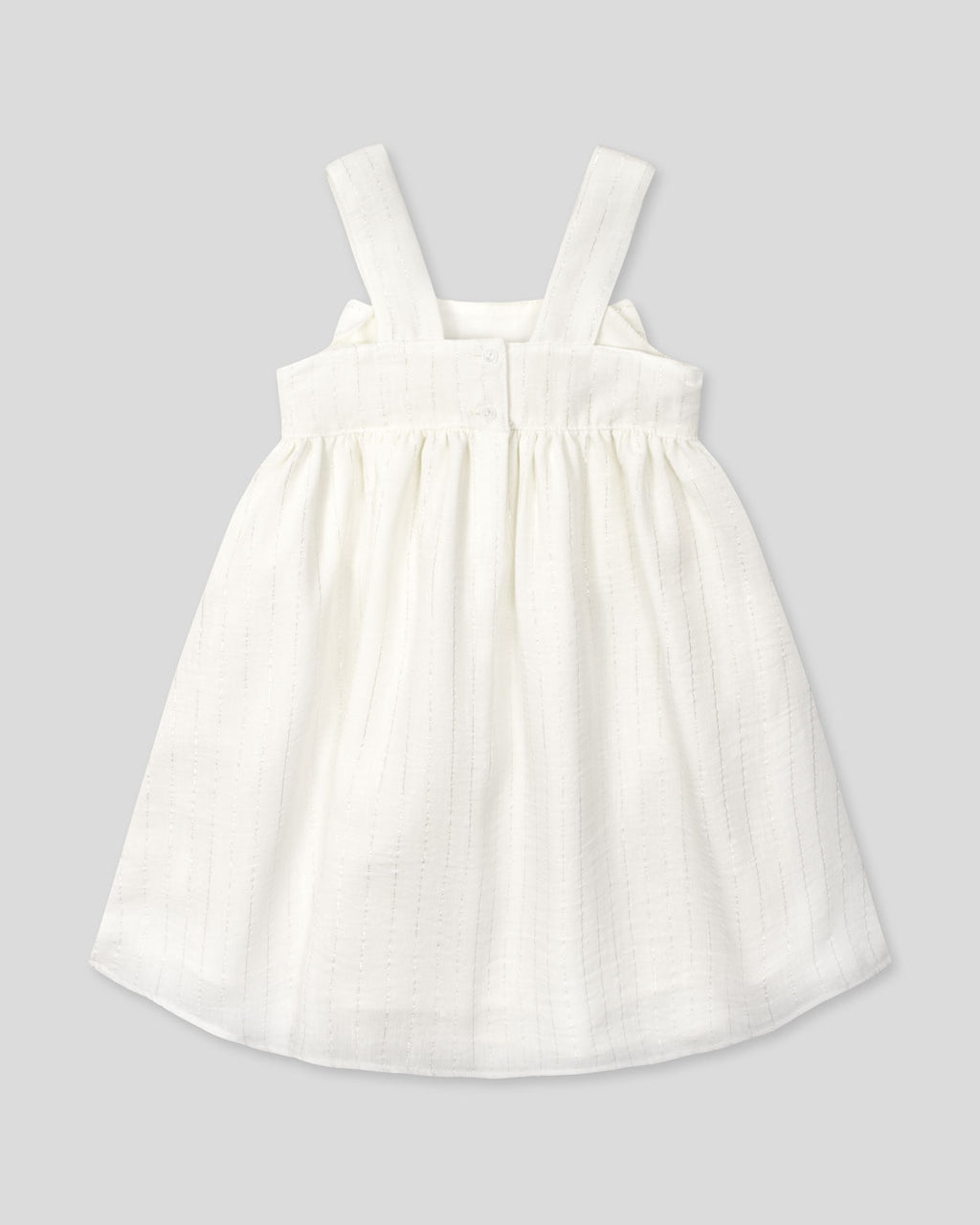 Vestido blanco con moño y líneas con brillos para niña