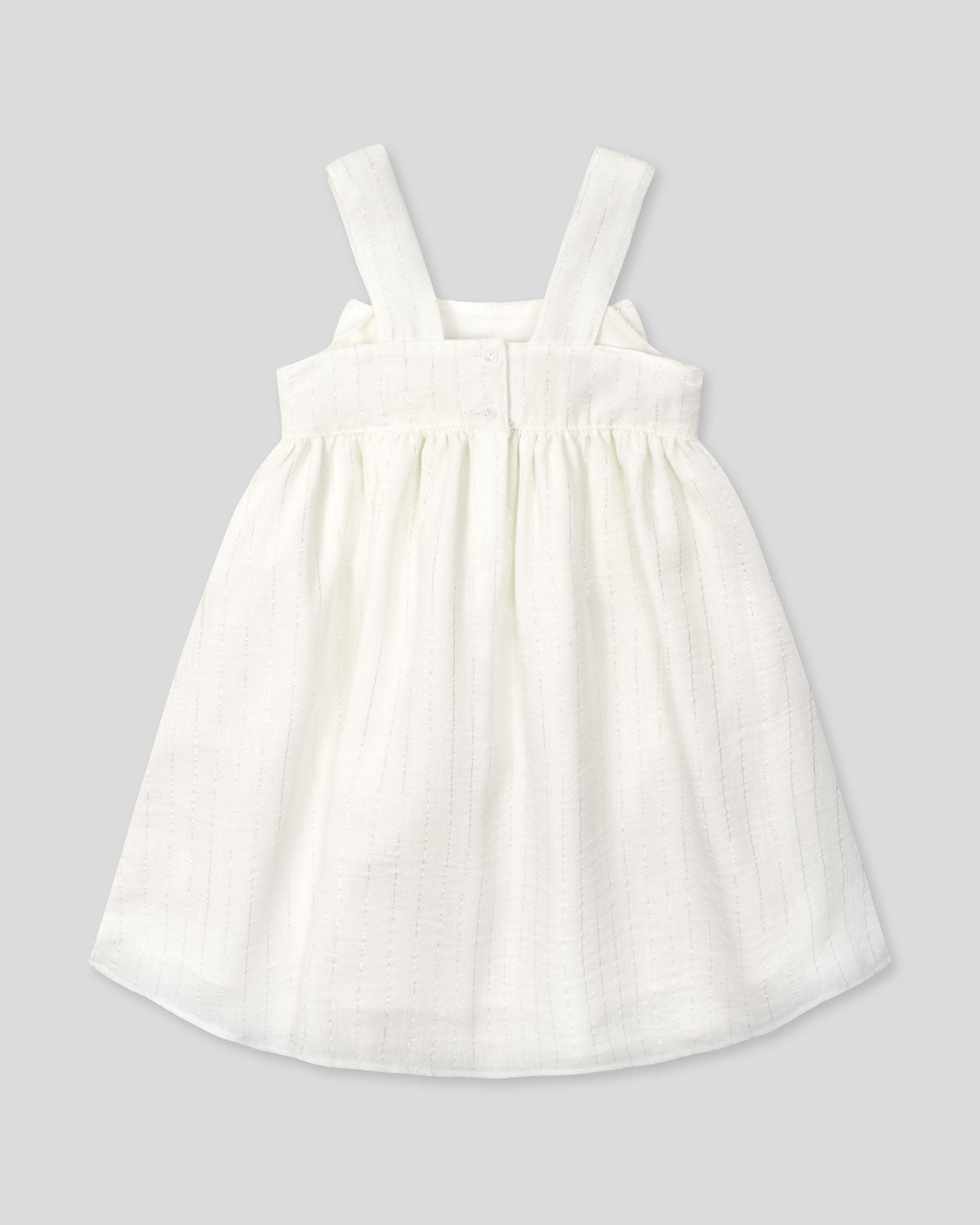 Vestido blanco con moño y líneas con brillos para niña