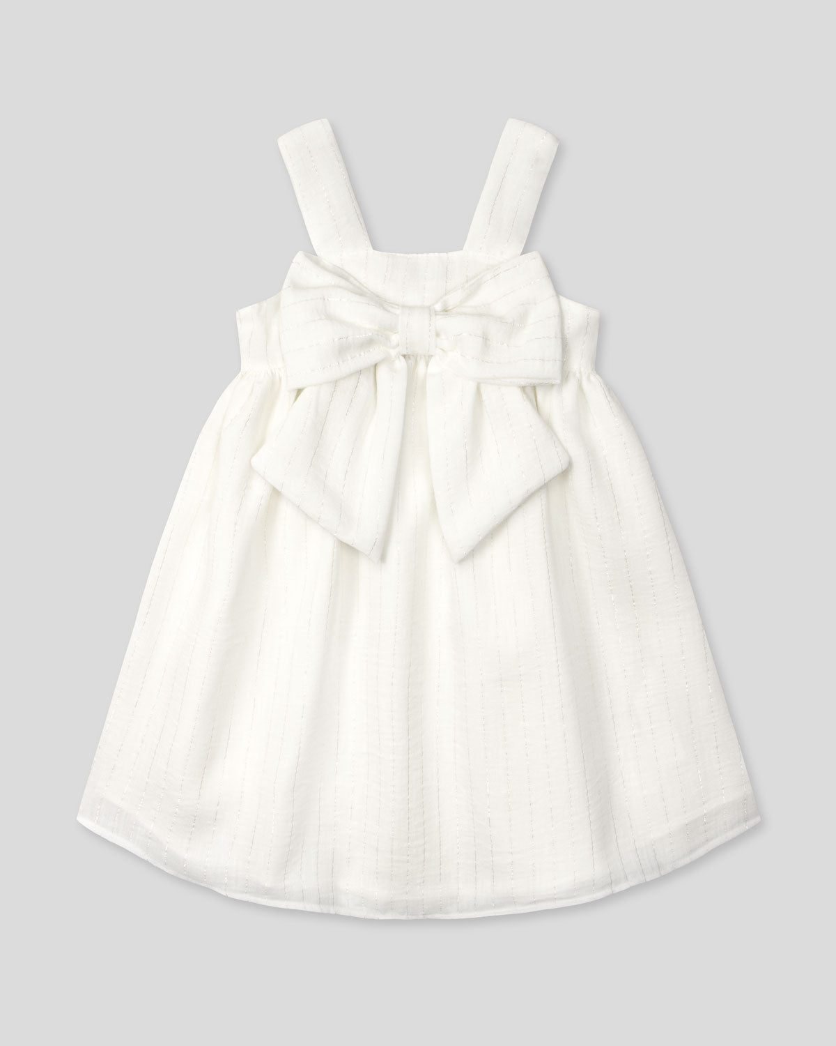 Vestido blanco con moño y líneas con brillos para niña