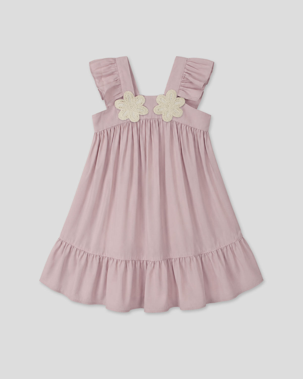 Vestido rosa de tiras con boleros y apliques de flor para niña