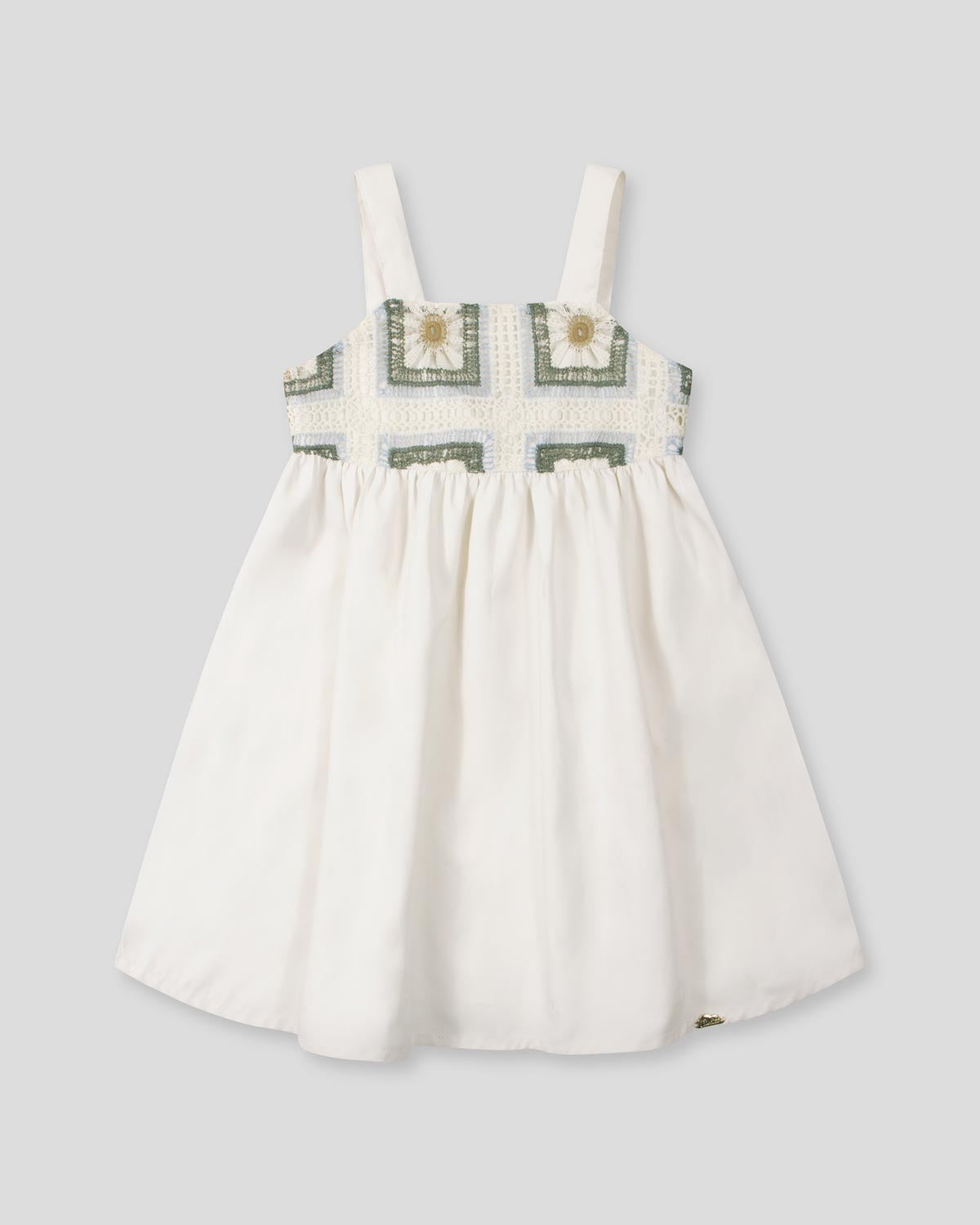 Vestido de tiras con textura tejida y lazos en espalda para niña