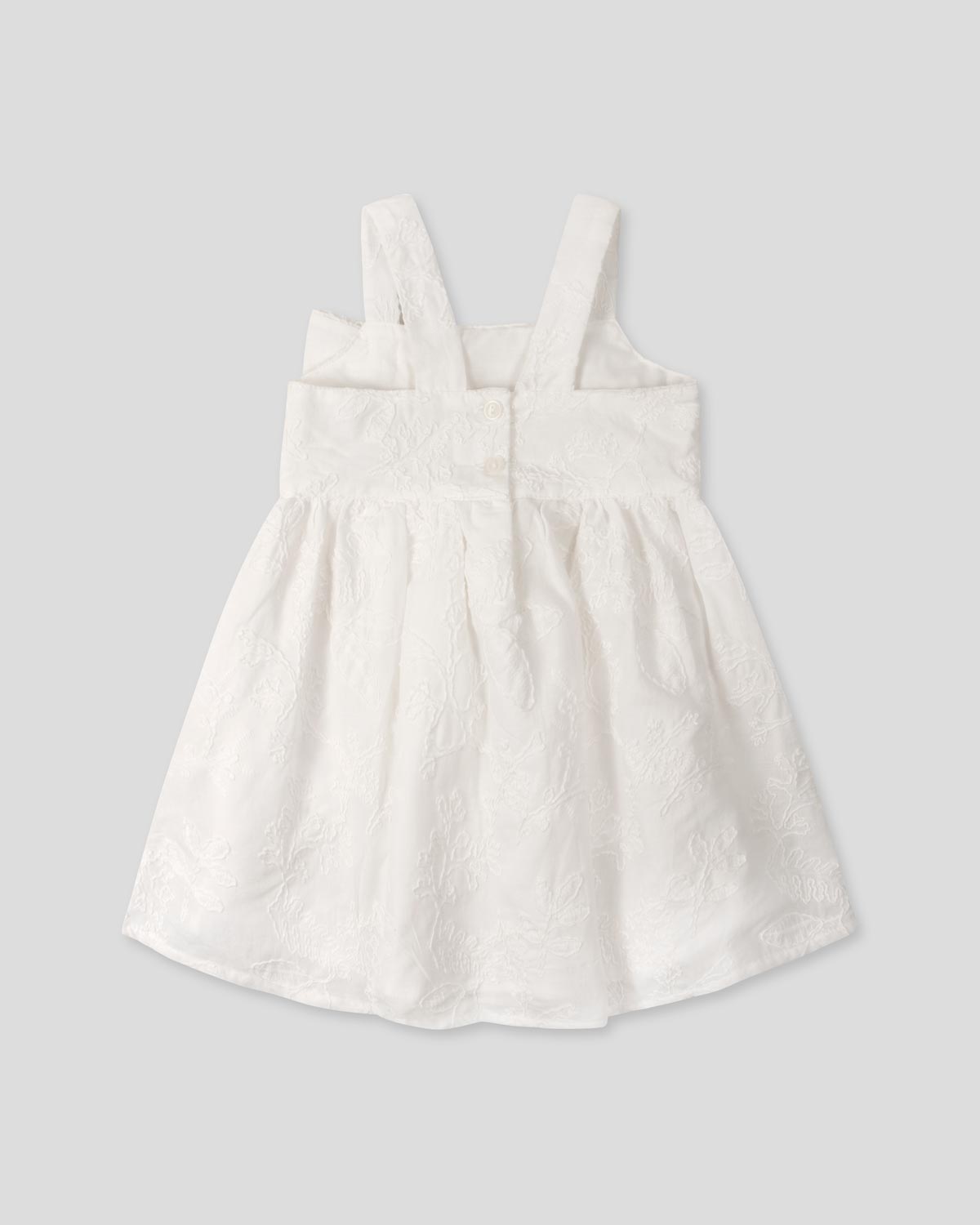 Vestido blanco de tiras con moño y tela bordada para niña