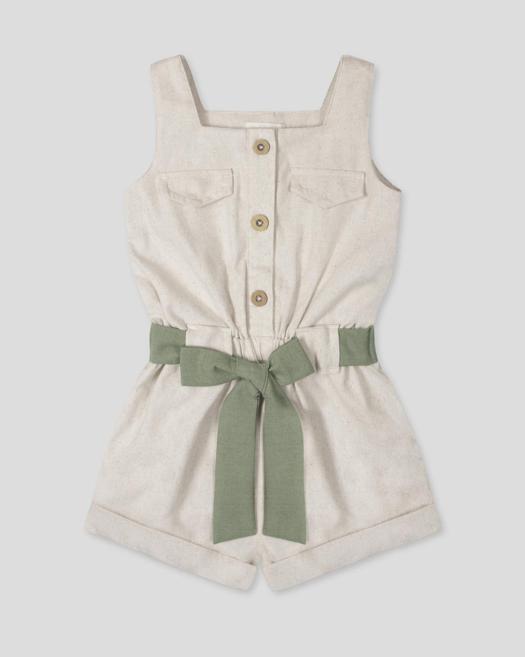 Enterizo en lino con botones y cinturón verde para niña