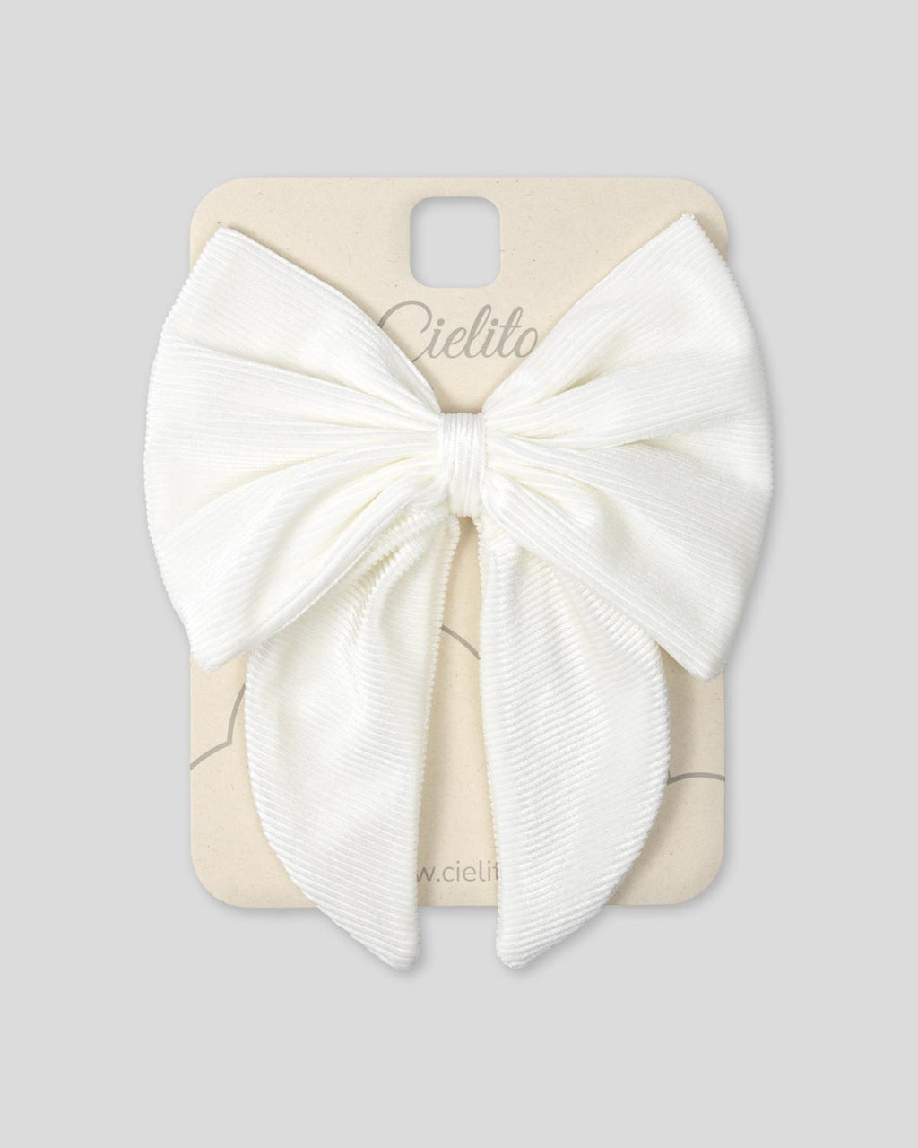 Moño pinza blanco en tela pana para niña