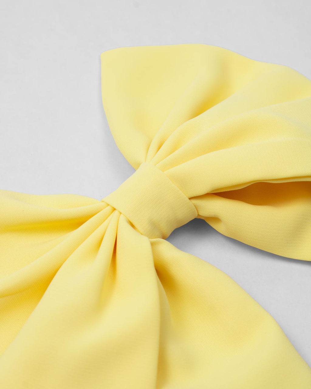 Moño pinza amarillo para niña