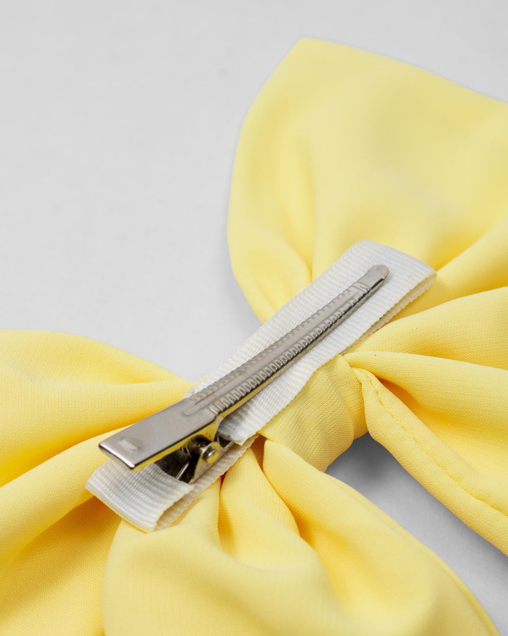 Moño pinza amarillo para niña