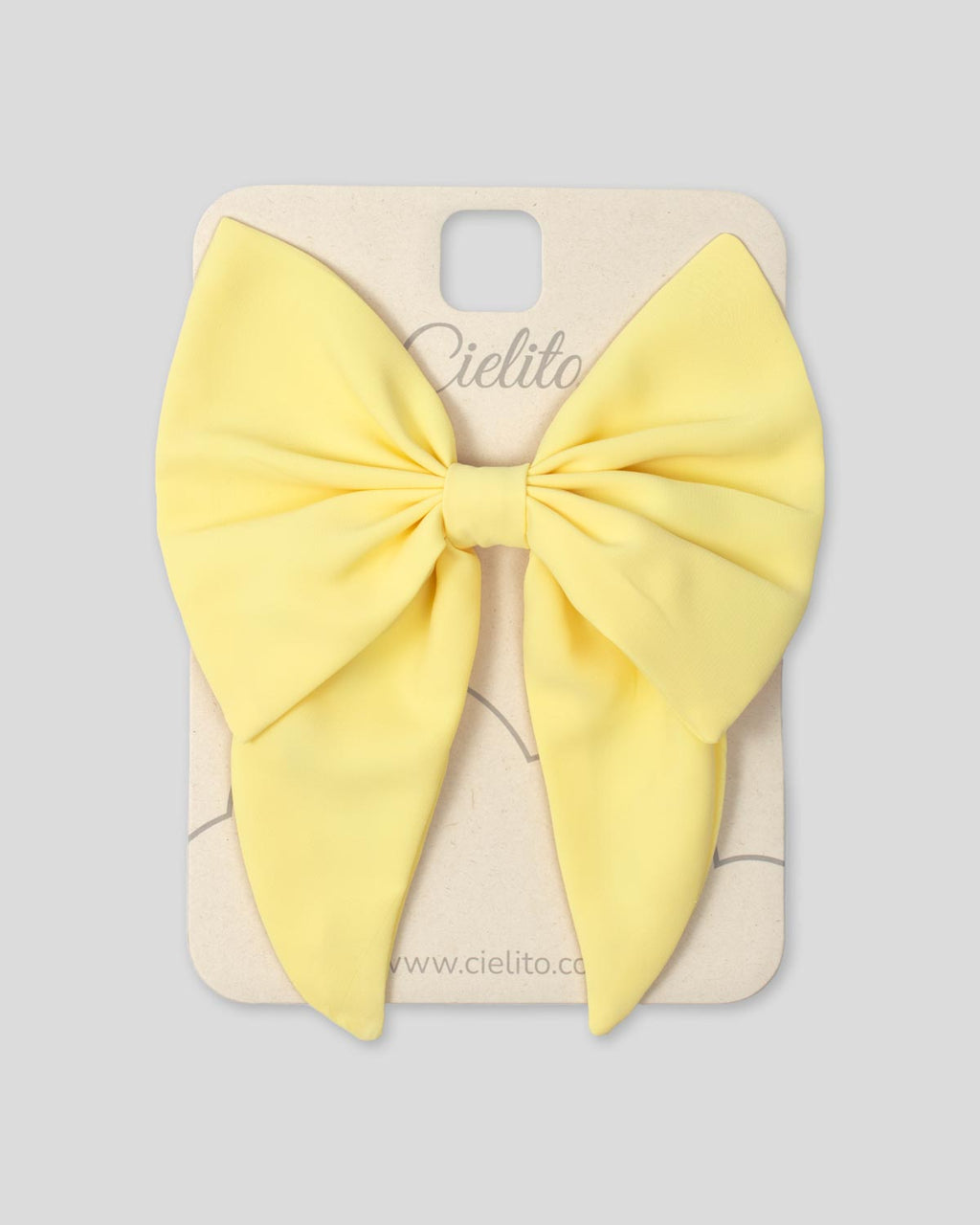 Moño pinza amarillo para niña