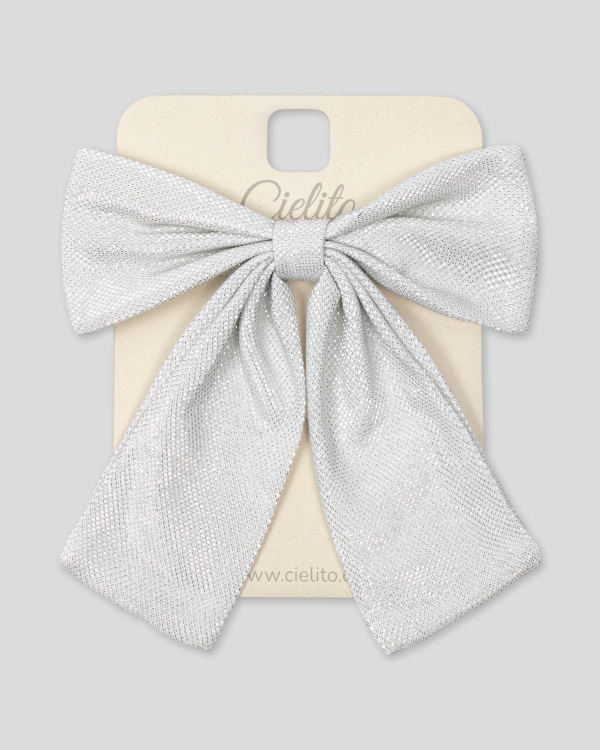 Moño pinza plateado para niña