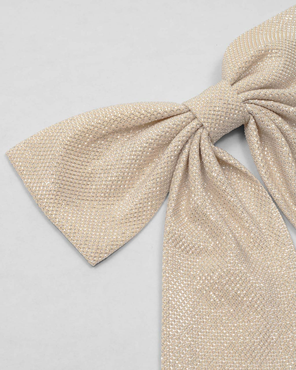 Moño pinza dorado para niña