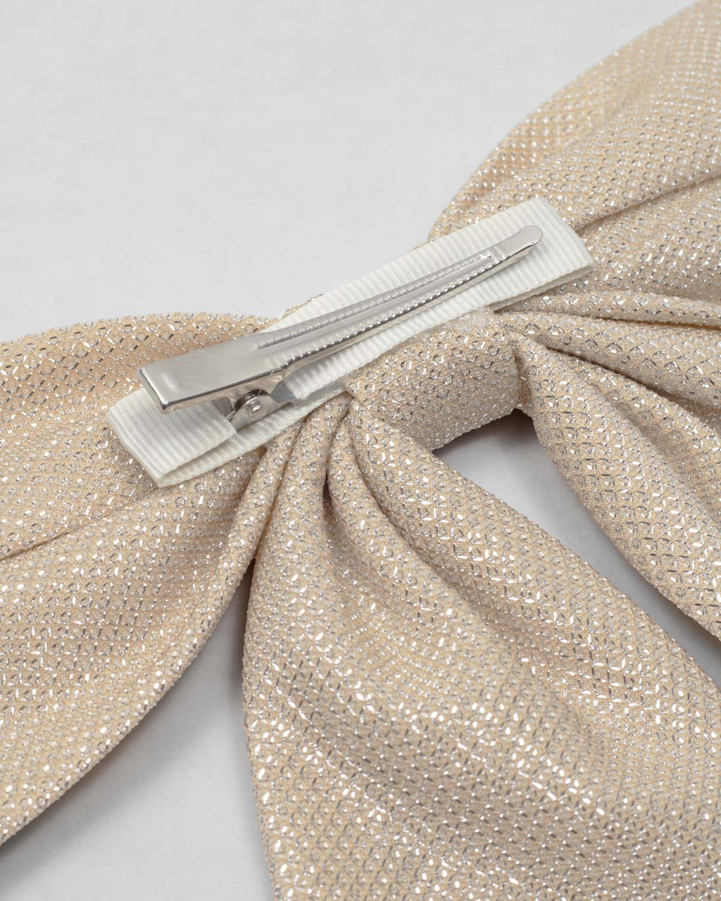 Moño pinza dorado para niña