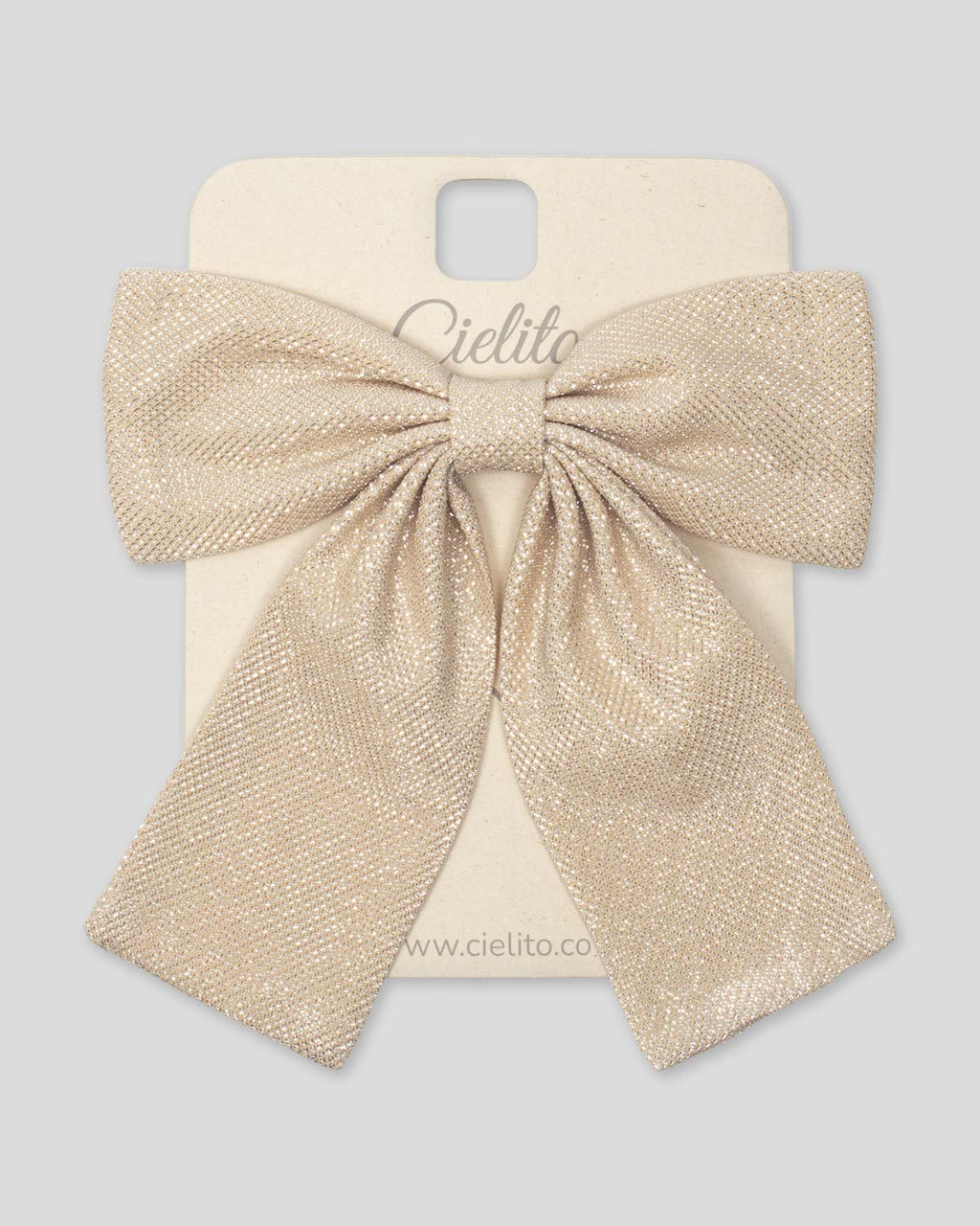 Moño pinza dorado para niña