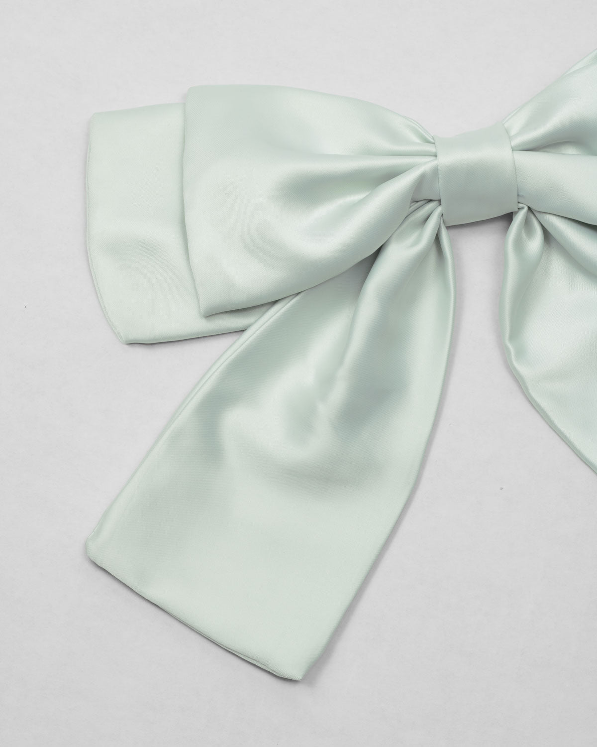 Moño pinza verde menta satinado para niña