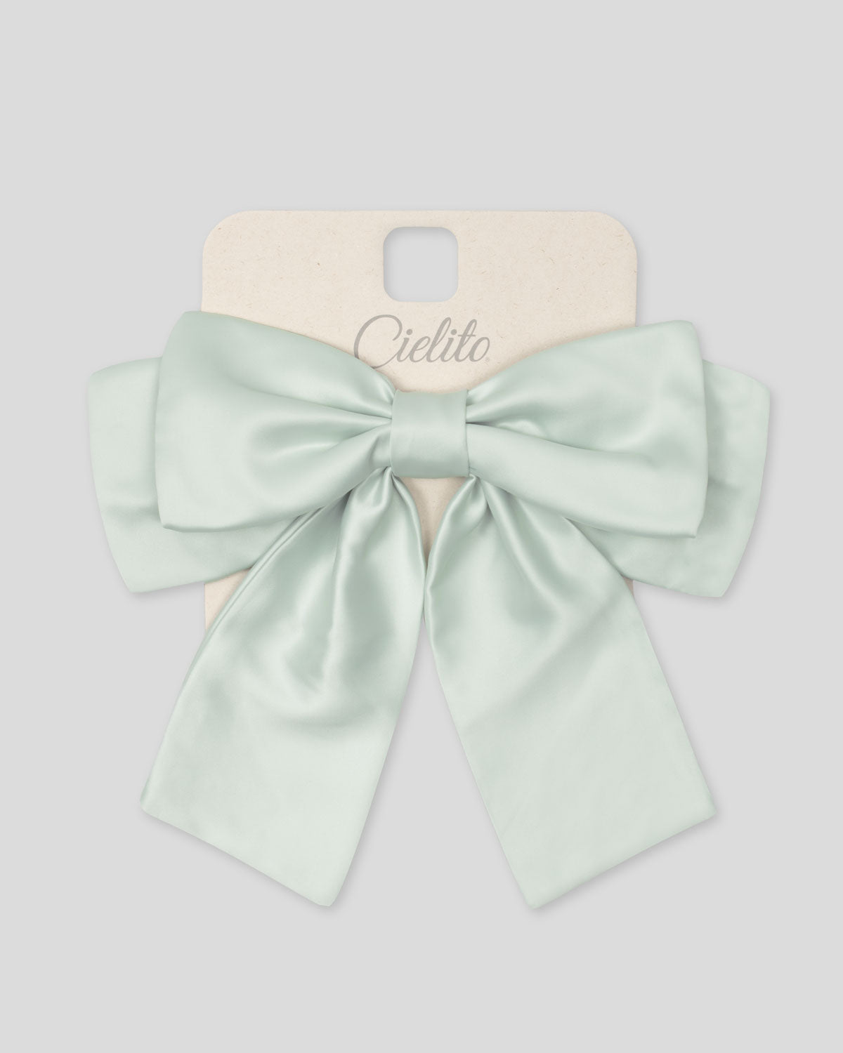 Moño pinza verde menta satinado para niña