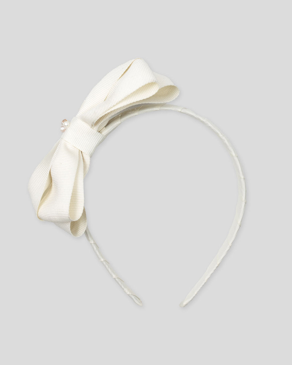 Diadema blanco crema con moñito para niña