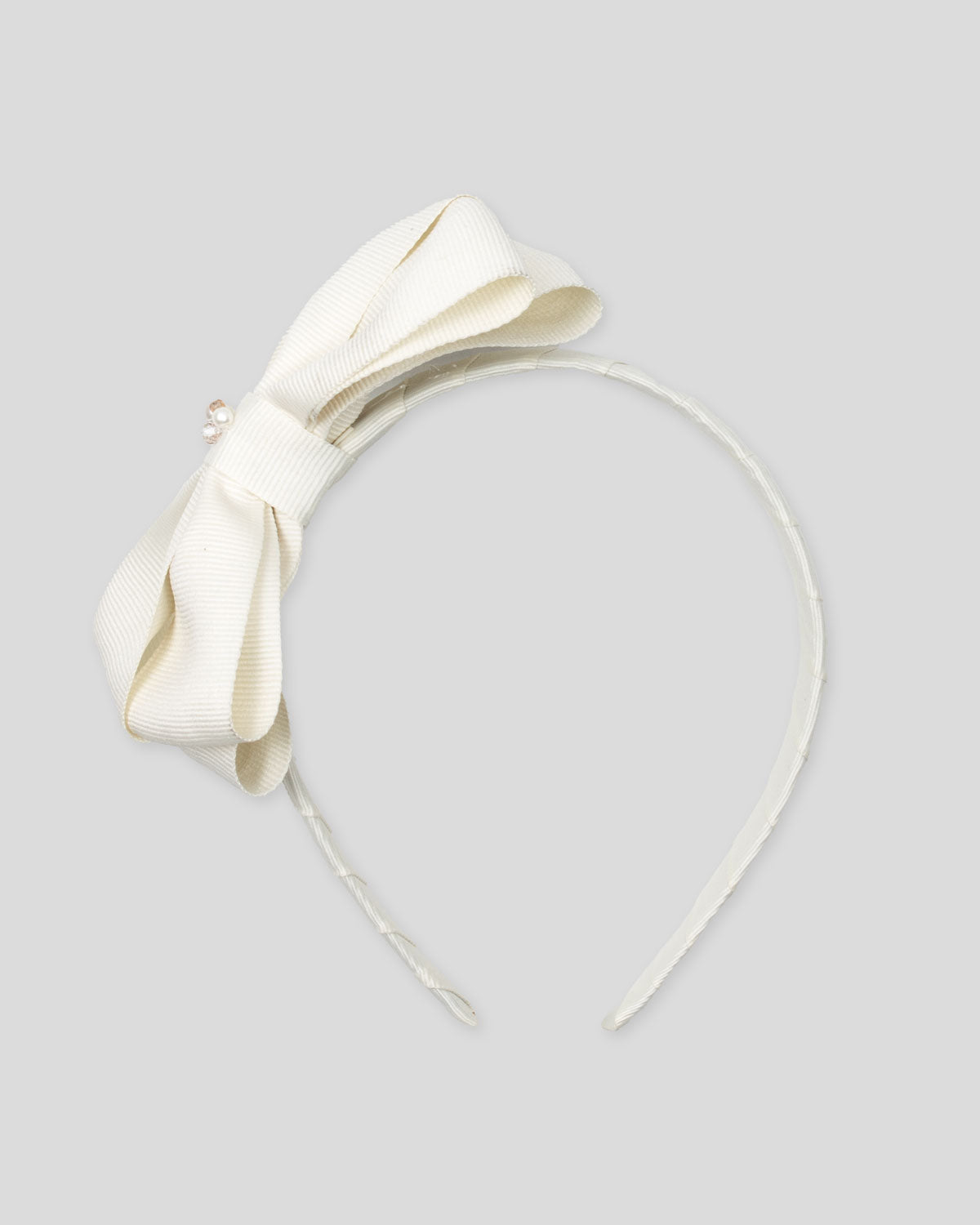 Diadema blanco crema con moñito para niña