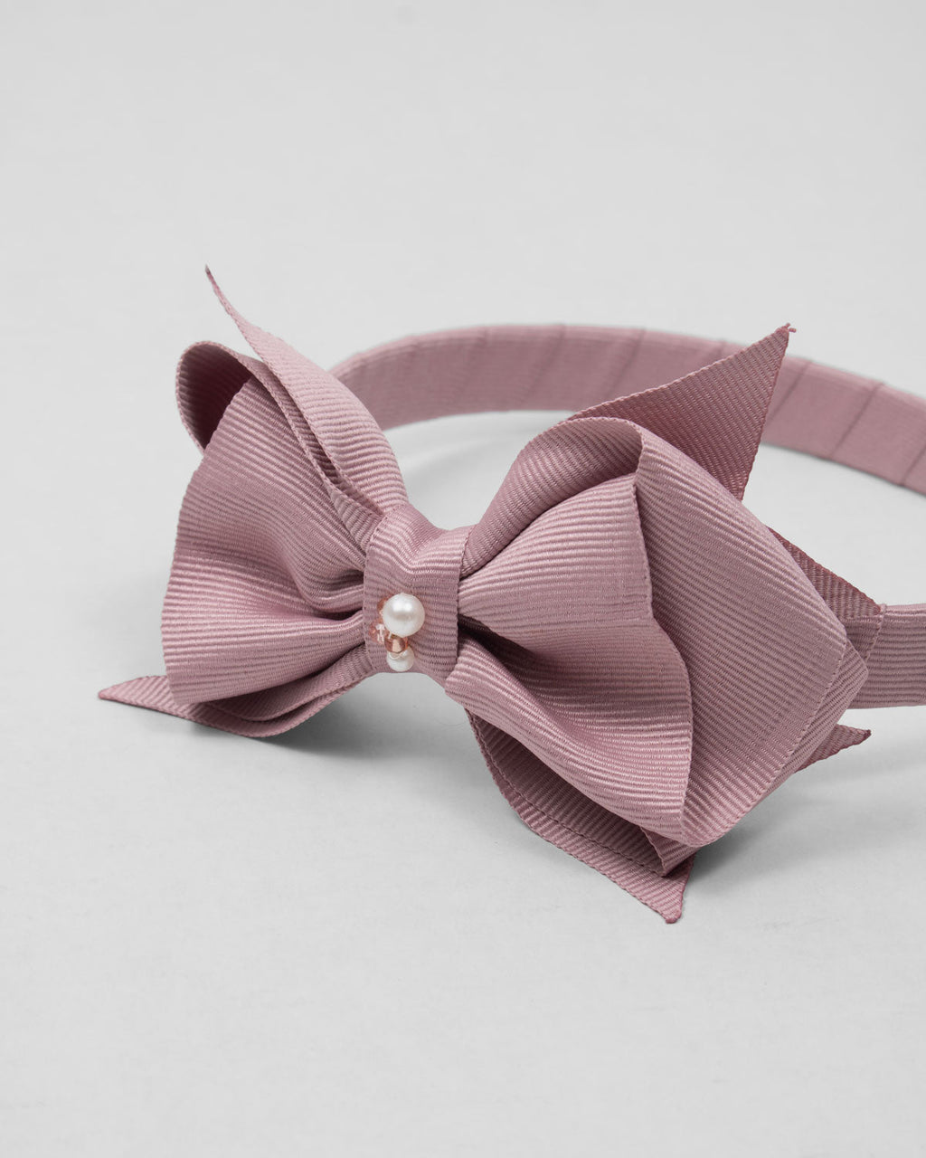 Diadema palo de rosa con moñito para niña