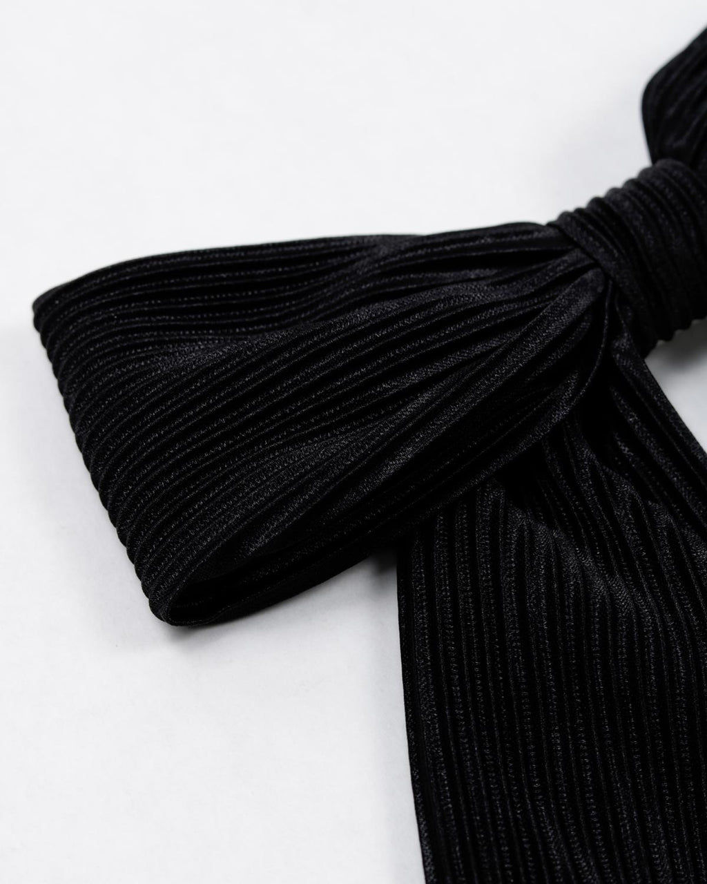 Moño pinza negro plisado para niña