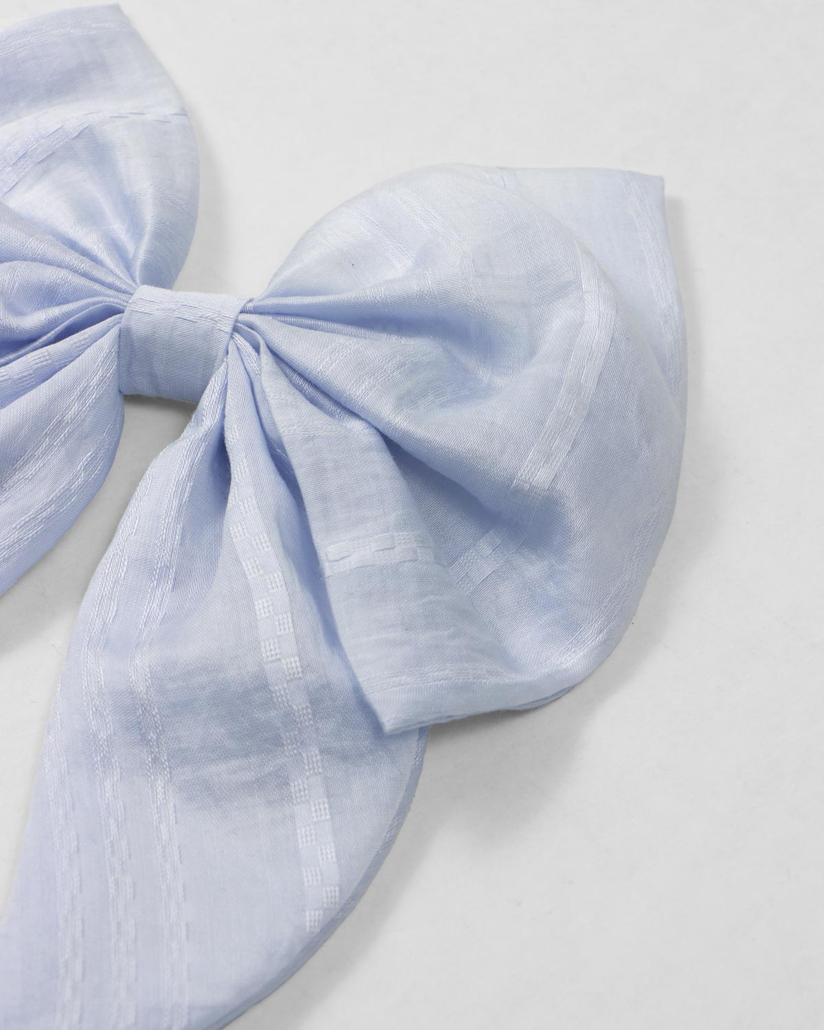 Moño pinza azul celeste para niña